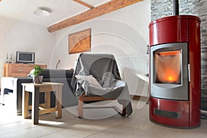 Red stove pellet in a living room photo