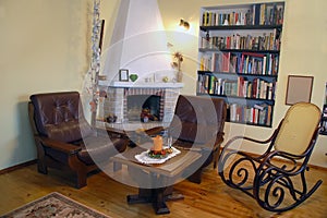 Fireplace with two armchairs
