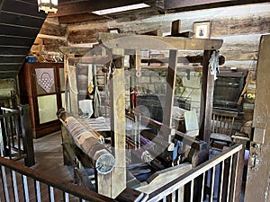 Weaverâs Loom Inside an 1800âs Recreated Home in Spring Mill State Park photo