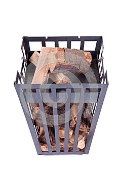 Fireplace wood in an iron brazier photo