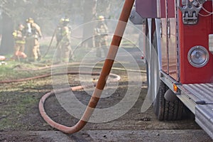 Firetruck and Hose photo