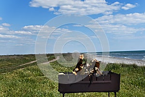 Firewood in a barbecue on the seashore. Picnic. Relax on the beach