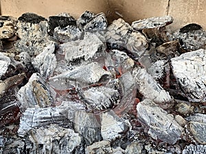 Firewood with coals burn