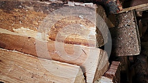 Firewood log. Pine wood. Pile of firewood. Woodpile of pine. Vertical video