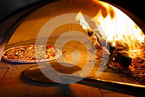 Firewood oven pizza photo