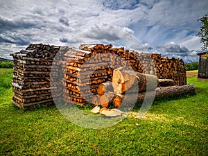 Firewood and thunderclouds