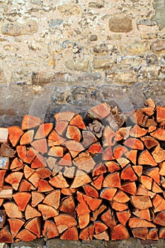 Firewood wood pile stacked triangle shape