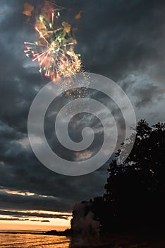 Firework in the evening sunset sky.