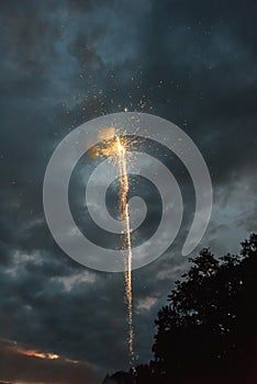 Firework in the evening sunset sky.