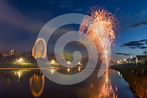 Firework at folk festival with ferris wheel in Regensburg