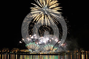 Firework over city at night