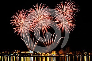 Firework over city at night