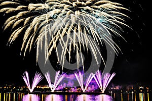 Firework over city at night