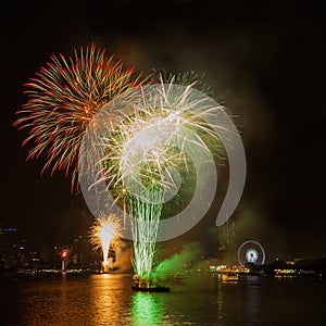 Firework show celebration time in new year party 2016 at Asiatique the river front Bangkok Thailand.