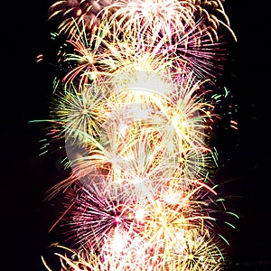 Firework streaks in night sky, celebration