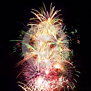 Firework streaks in night sky, celebration