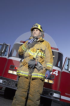 Fireworker Talking On Walkie Talkie photo