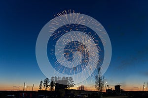 Fireworks against a dark blue sky without clouds