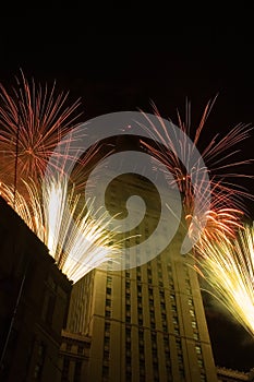 Fireworks around a tall building