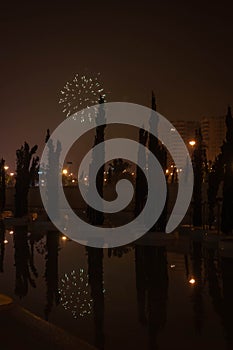 Fireworks on the background of the night city in Valencia, Spain