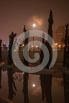 Fireworks on the background of the night city in Valencia, Spain