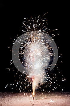 Fireworks in the backyard. Bright festive fireworks and sparkler on a black background . Isolated.