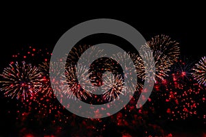 Fireworks on black background for celebration design. Abstract red firework display background.
