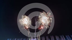 fireworks on a black background Frame or border from golden sparks and firecrackers isolated on new year