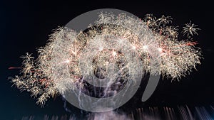 fireworks on a black background Frame or border from golden sparks and firecrackers isolated on new year