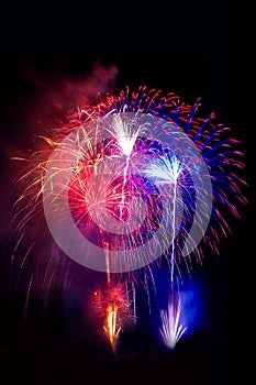 Fireworks celebrate of Loy Kratong Festival with night light bangkok cityscape background