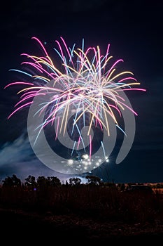 Fireworks of different colors with the black background