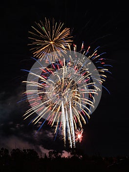 Fireworks of different colors with the black background