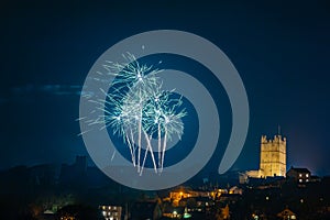 Fireworks display above Richmond Castle, North Yorkshire with houses in the foreground