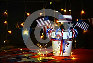 Fireworks display celebrates the independence Day of the United States of America nation on the fourth of July with the us flag ,