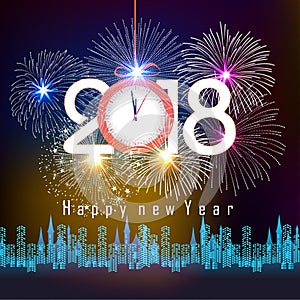 Fireworks display for happy new year 2018 above the city with clock