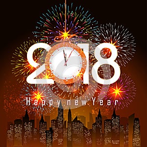 Fireworks display for happy new year 2018 above the city with clock