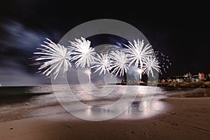 Fireworks display, night show on seafront, pyrotechnic festival. Antibes Juan les Pins