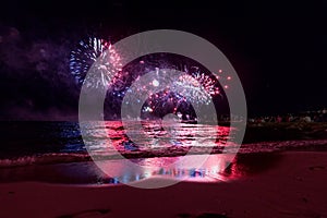 Fireworks display, night show on seafront, pyrotechnic festival. Antibes Juan les Pins