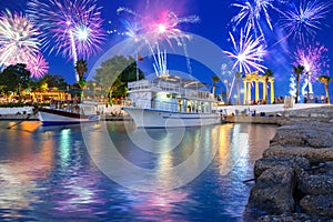 Fireworks display over the harbour with boats in Side, Turkey photo