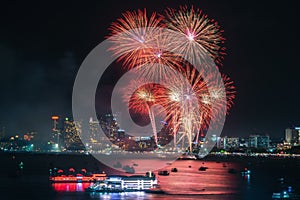 Fireworks international colorful Pattaya beach cityscape at night scene for advertise traveling event holiday.