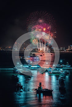 Fireworks international colorful Pattaya beach cityscape at night scene for advertise traveling event holiday