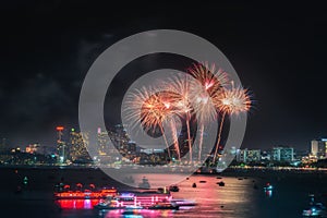 Fireworks international colorful Pattaya beach cityscape at night scene for advertise traveling event holiday