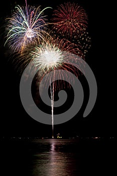 Fireworks with lake reflection