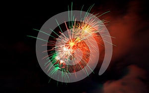 Fireworks light up close-up against dark sky