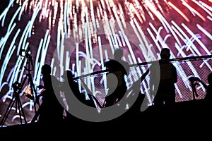 Fireworks and a lot of people silhouette