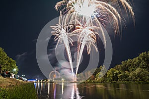 Fireworks of the Maidult with Ferris wheel in Regensburg, Germany