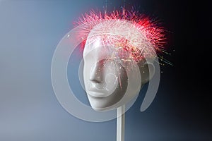 Fireworks in a neutral mannequin head, concept for ideas, inspiration and creative connections but also for neurology, headache,