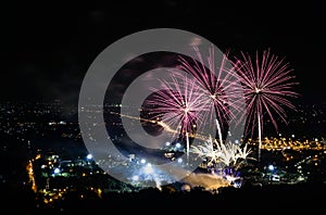 Fireworks on night city background