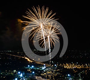 Fireworks on night city background