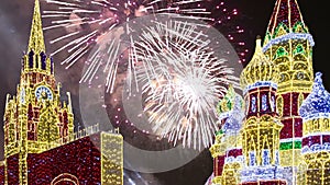 Fireworks over the Christmas decoration on the area of the Kiyevskaya Kiyevsky Railway Station at night, Moscow, Russia